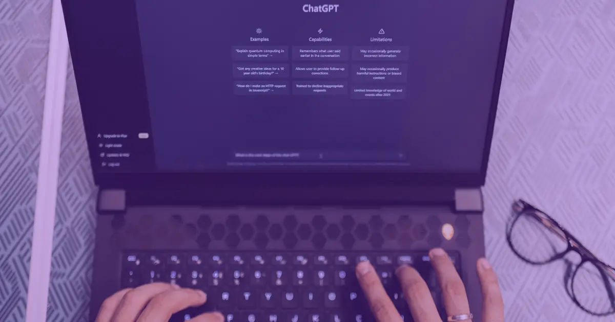 hands typing at ai chat prompt
